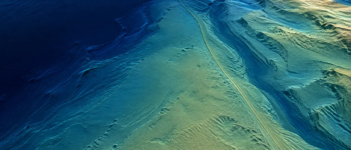 Illustrative earlier seabed with no localized scour depression.