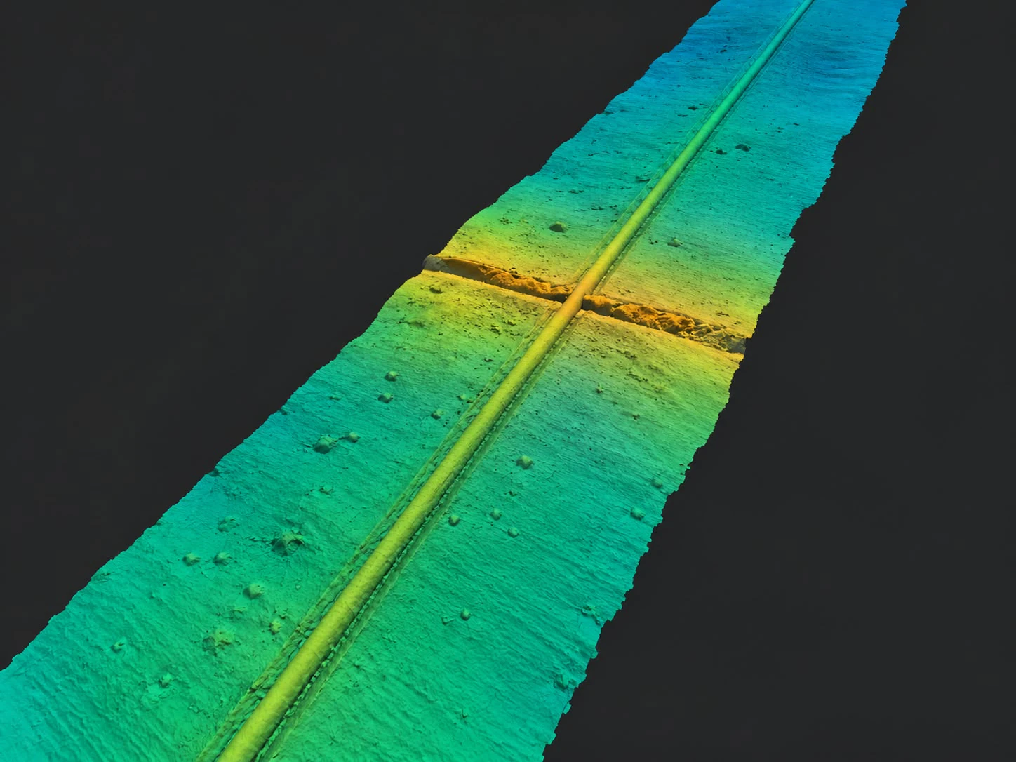 Illustrative subsea pipeline along a turquoise seabed corridor crossed by a trench.
